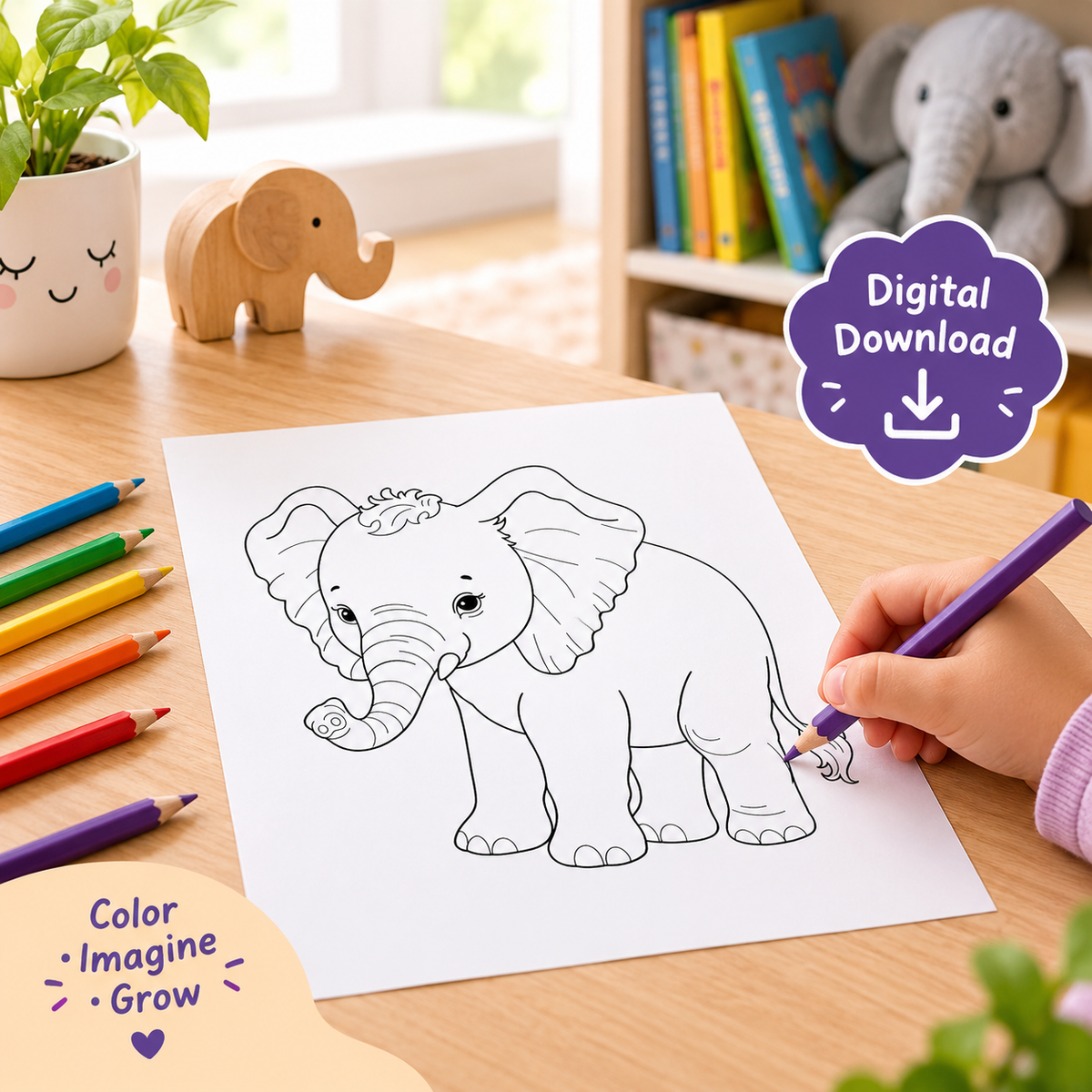 A child's hand holds a purple pencil over a printed elephant coloring page on a wooden desk, with colored pencils, a small wooden elephant, books, and a plush elephant in the background. Promotional badges read 'Digital Download' and 'Color Imagine Grow'.