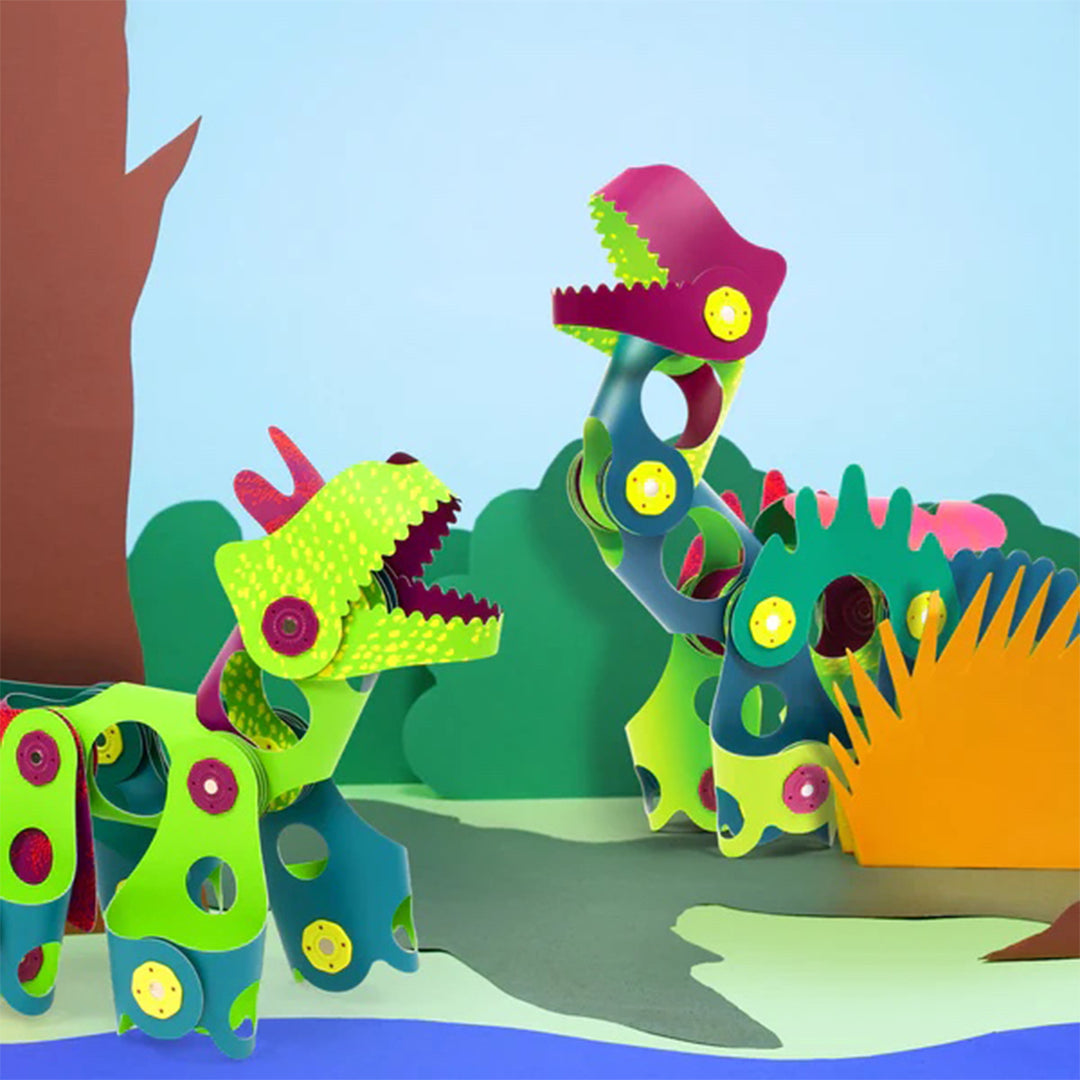 Preschool multi-level modular STEAM magnetic snapping blocks with prehistoric textures and creative activity toys.