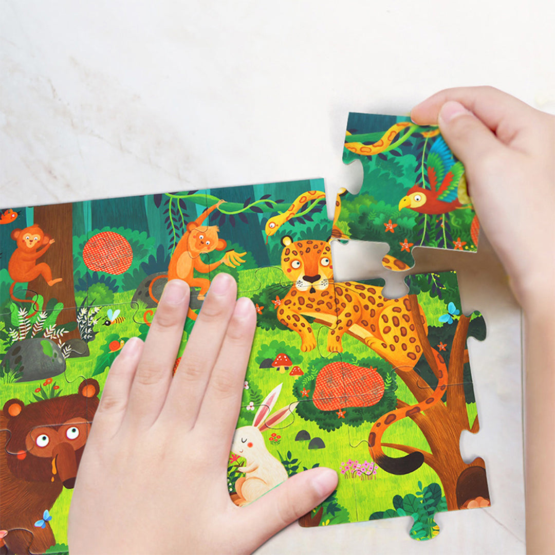 Montessori-inspired red perspective glasses for hidden animal open-ended play.