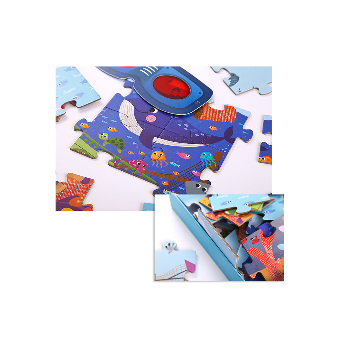 Montessori-inspired red marine perspective glasses for hidden sea life open-ended play.