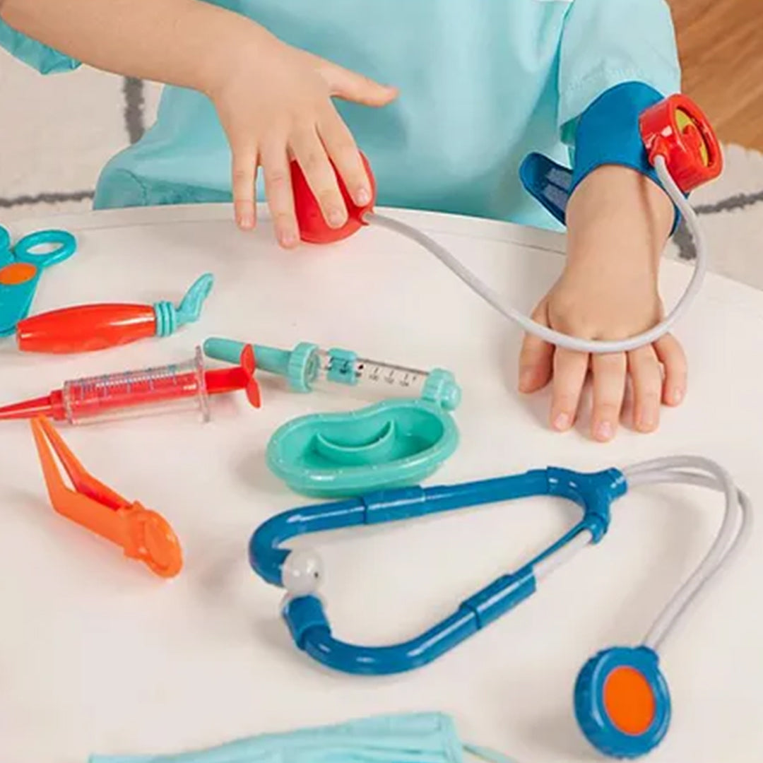 Child playing with the Battat Deluxe Doctor Kit
