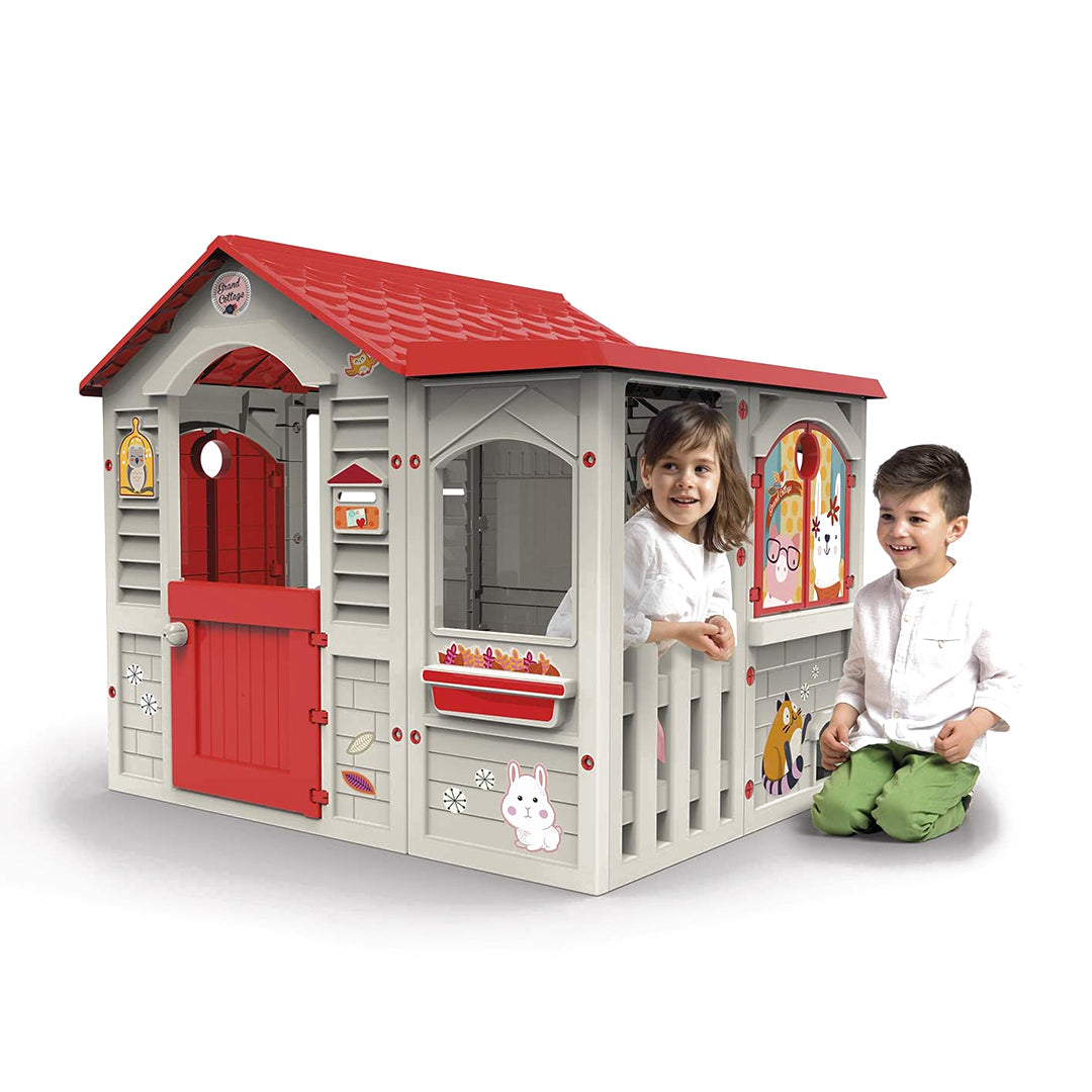 Front view of the Chicos Casa XL Grand Cottage, showing the spacious entrance, hinged windows, and colorful sticker decorations.