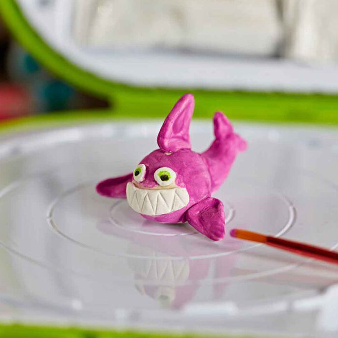 Crayola Clay Sculpting Station art kit with a finished sculpted character
