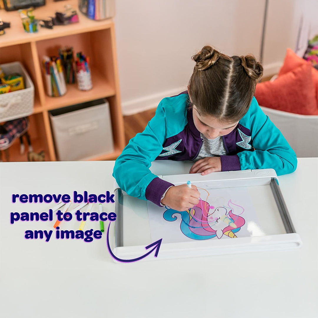 A child drawing on the light-up board with a Gel FX marker
