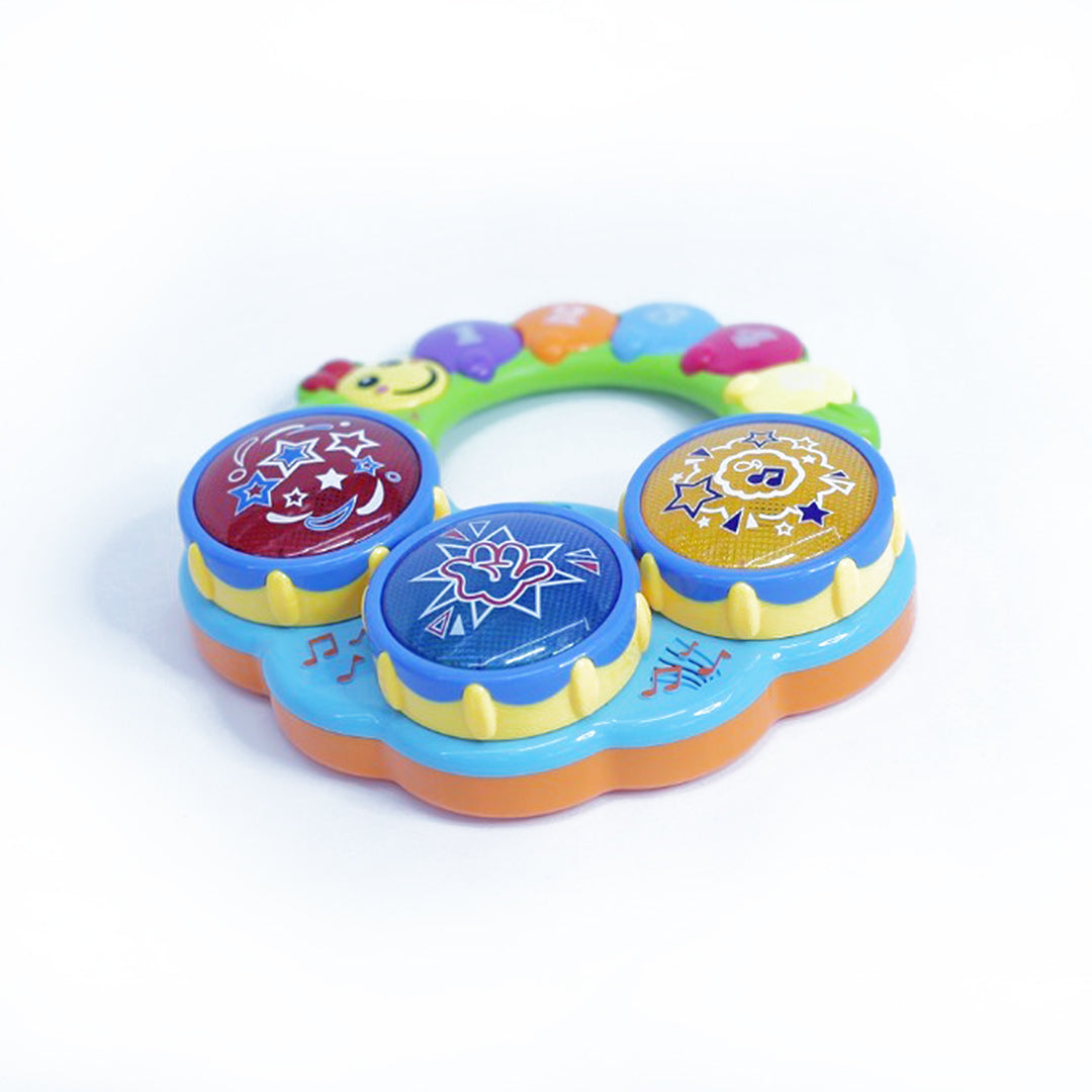 Baby exploring the different sounds on the Baby Hand Drum Electronic Organ Set