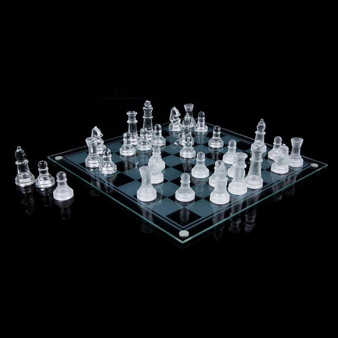 A close-up of a glass pawn with the soft felt padding on the bottom
