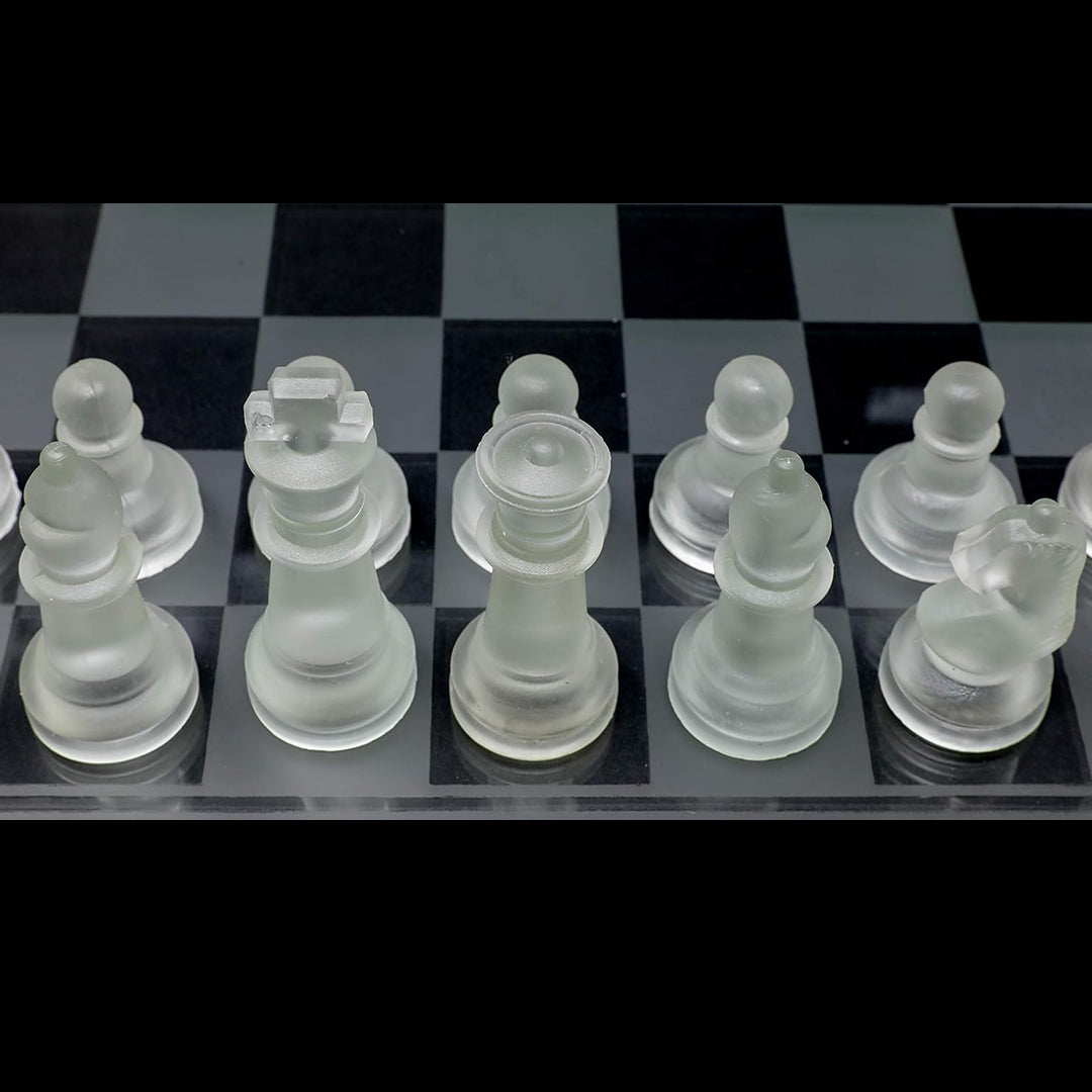 A chess game in progress on the elegant glass board
