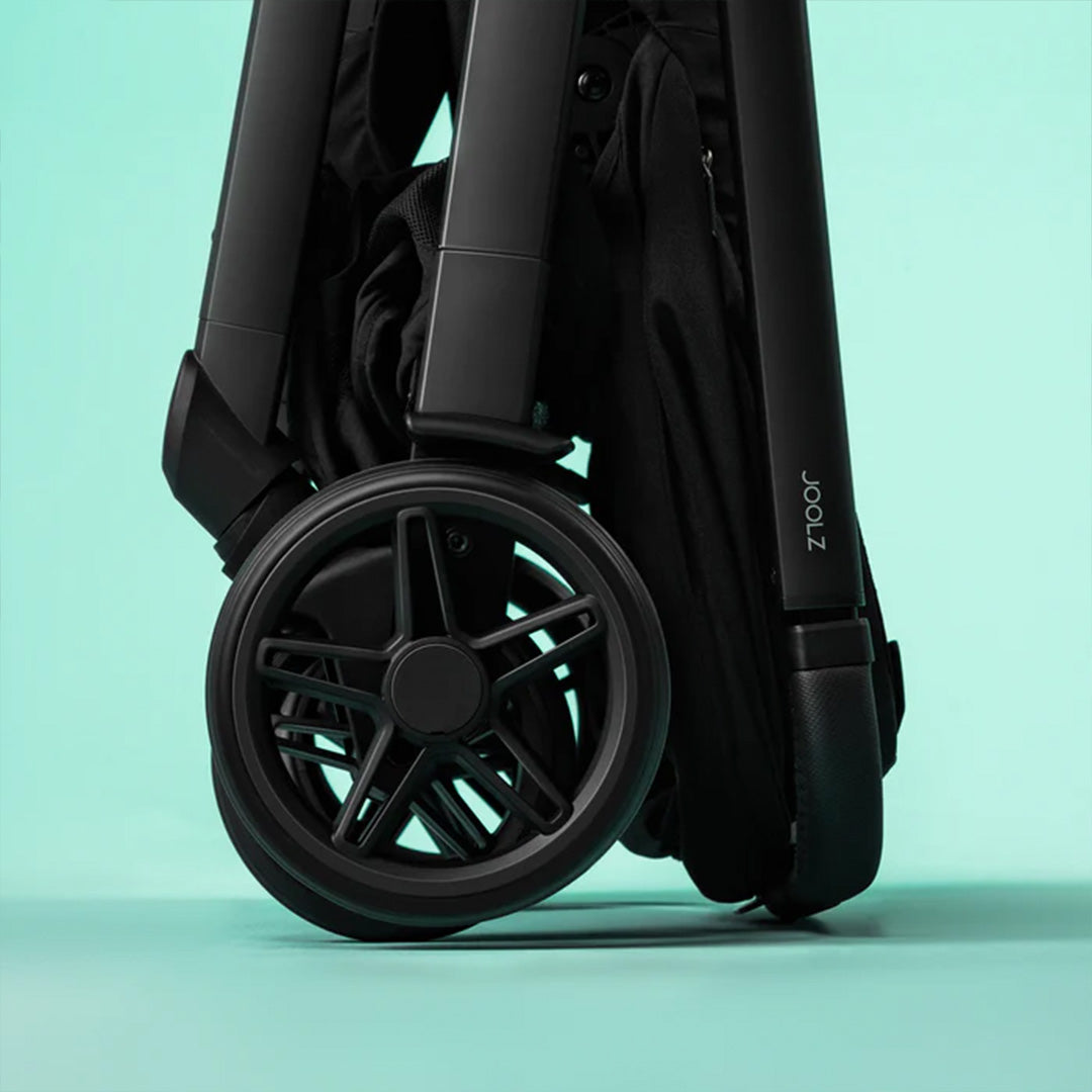 The Joolz Hub² in Forest Green folded down