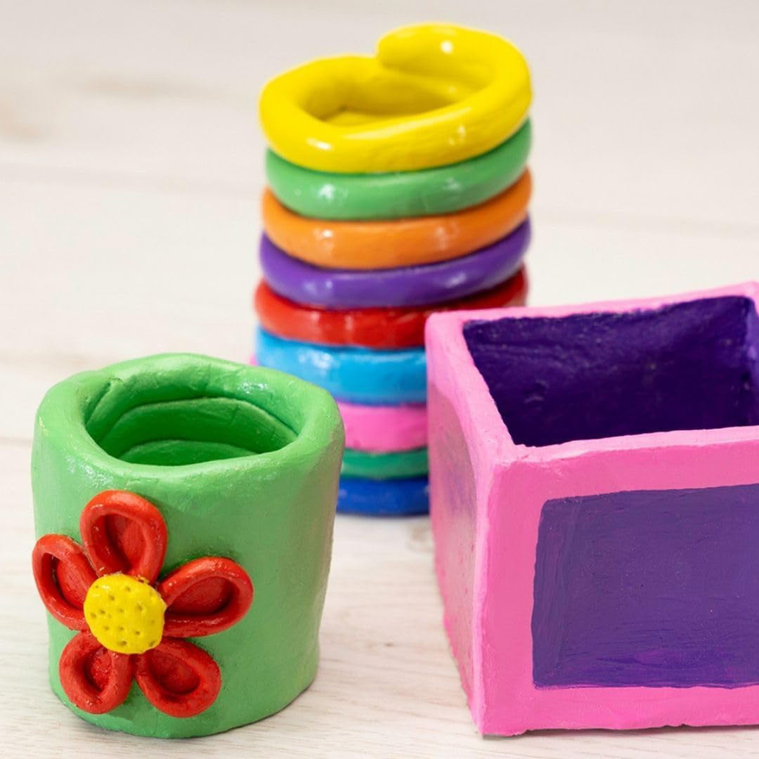 Non-toxic toys pottery kit showing painted clay pots and vases.