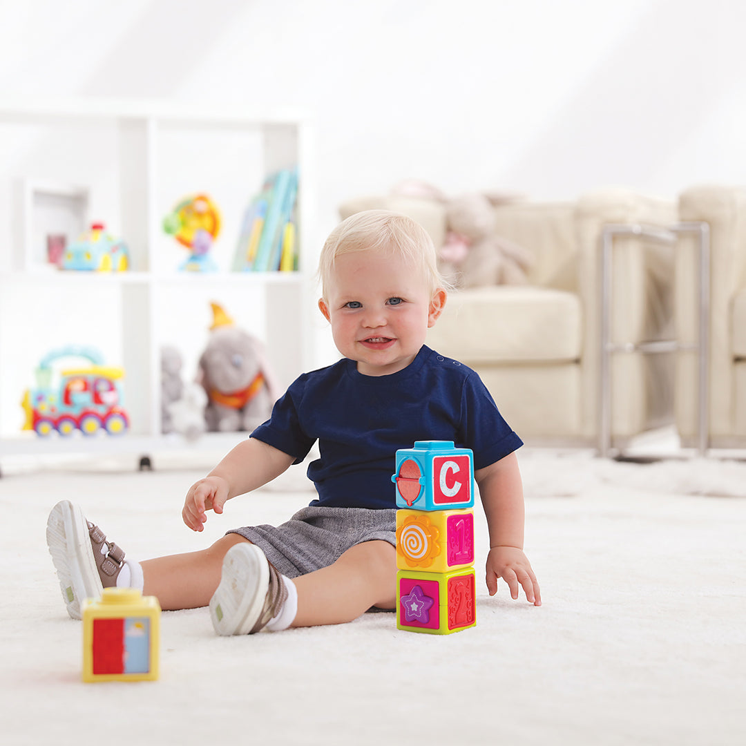 Baby playing with the Hapee Capee Stacking Blocks
