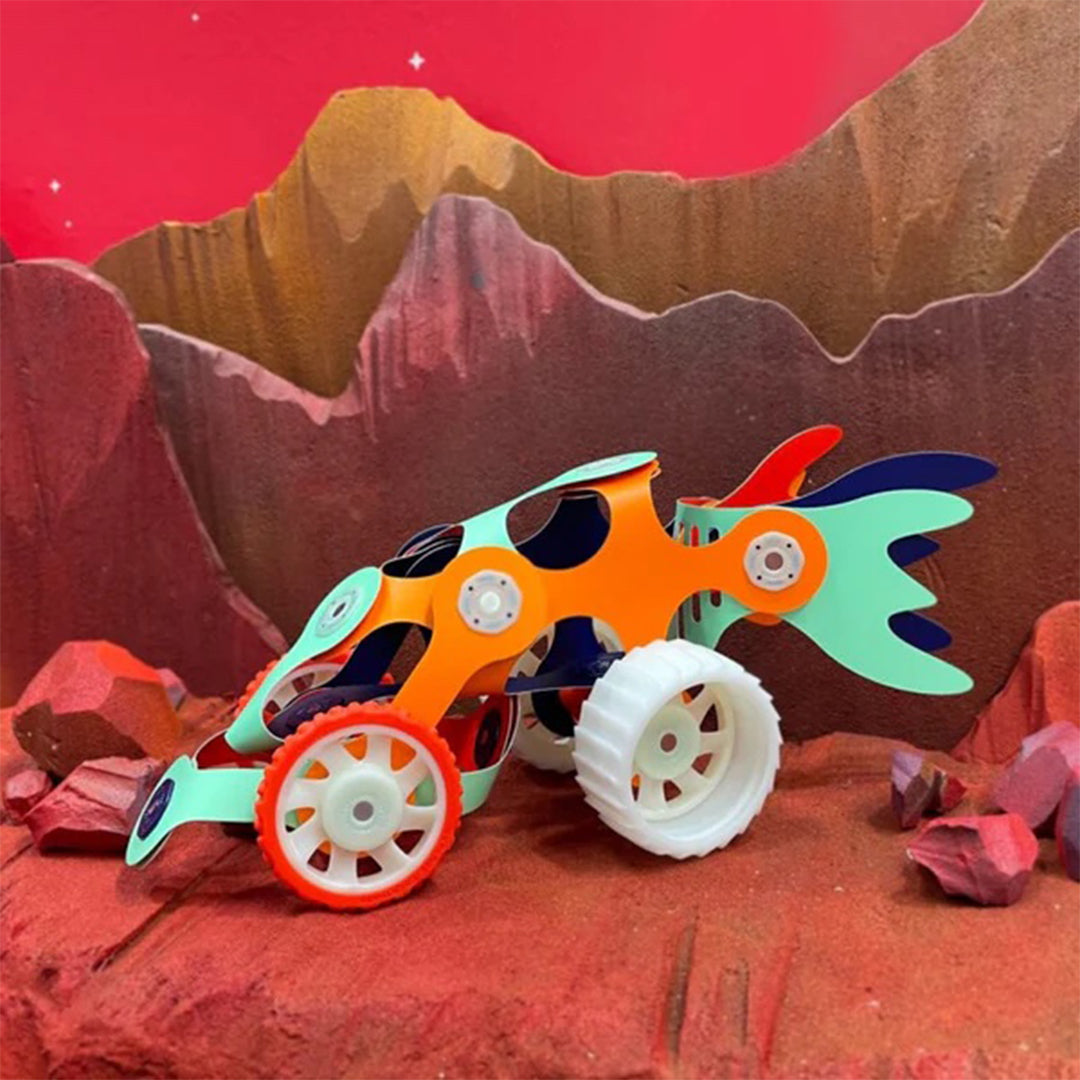 Preschool multi-level modular STEAM magnetic snapping blocks with fire blasters and creative activity toys.
