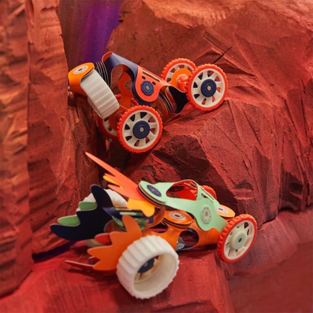 Montessori-inspired glowing planetary rover and space drone magnetic builder shapes for open-ended play.
