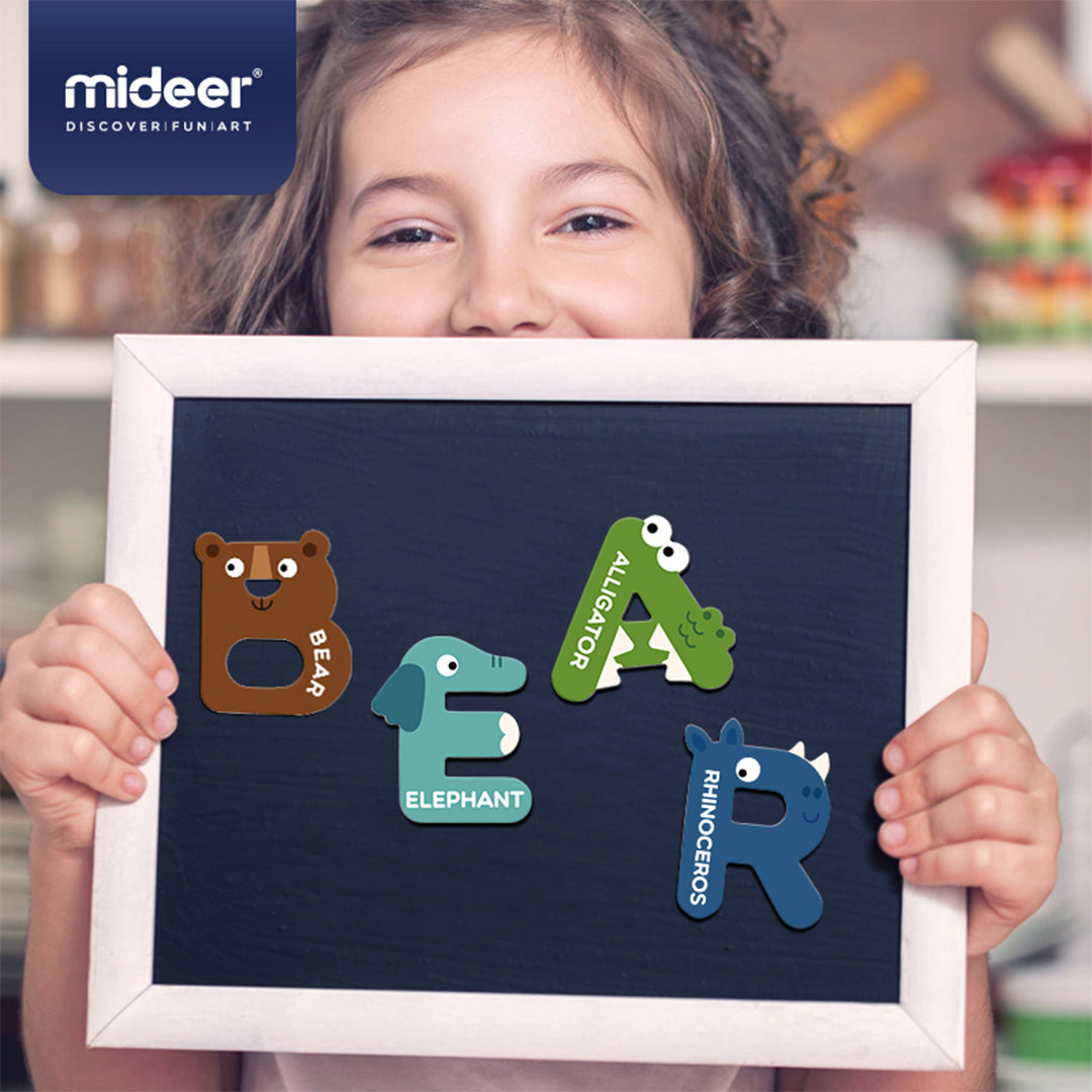 Montessori wooden animal alphabet stickers on refrigerator for active screen-free play.
