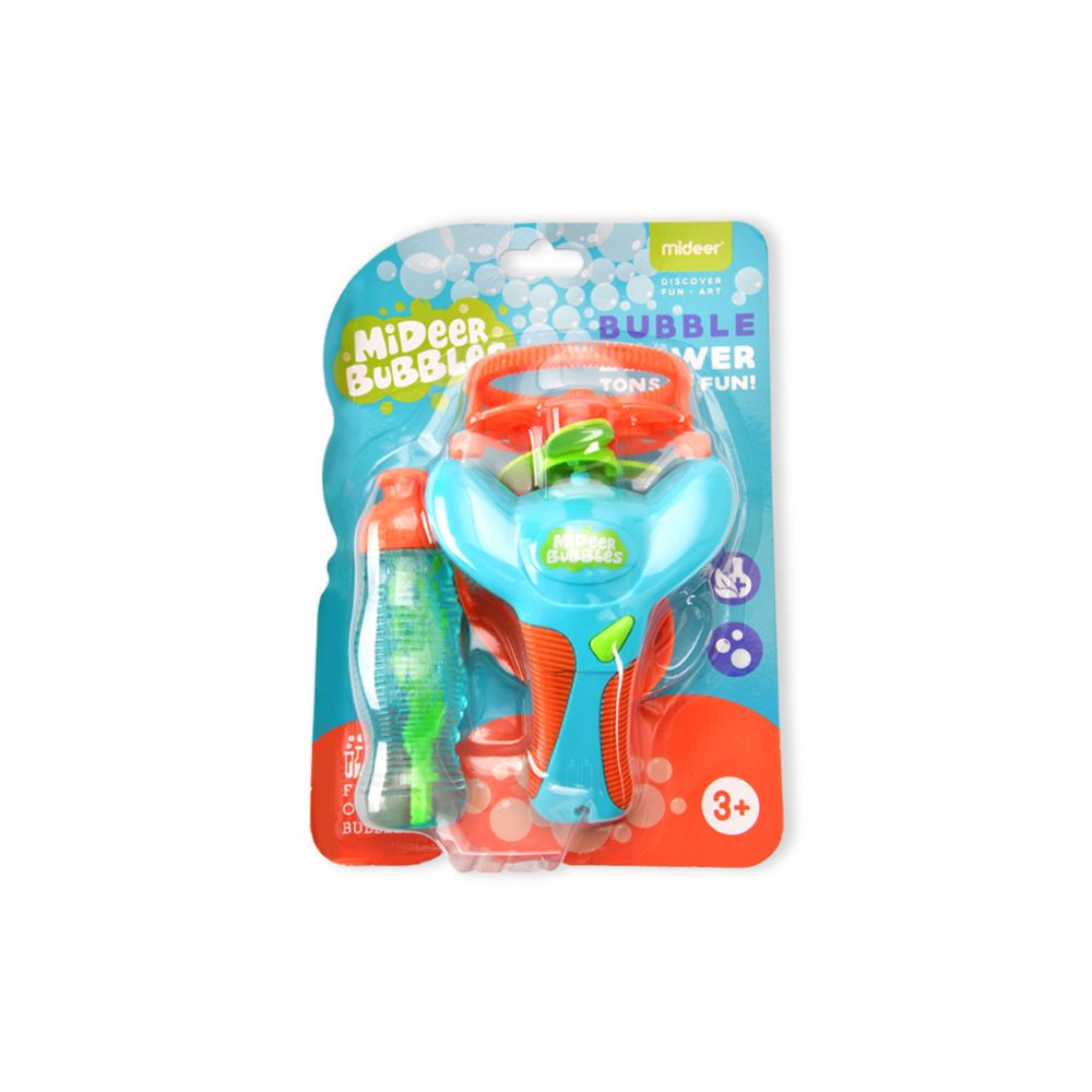 A packaged toy bubble gun set on a white background. The product includes a light blue bubble wand with orange and green accents, a green bubble brush, and a clear bubble bottle, all attached to a colorful blister card.