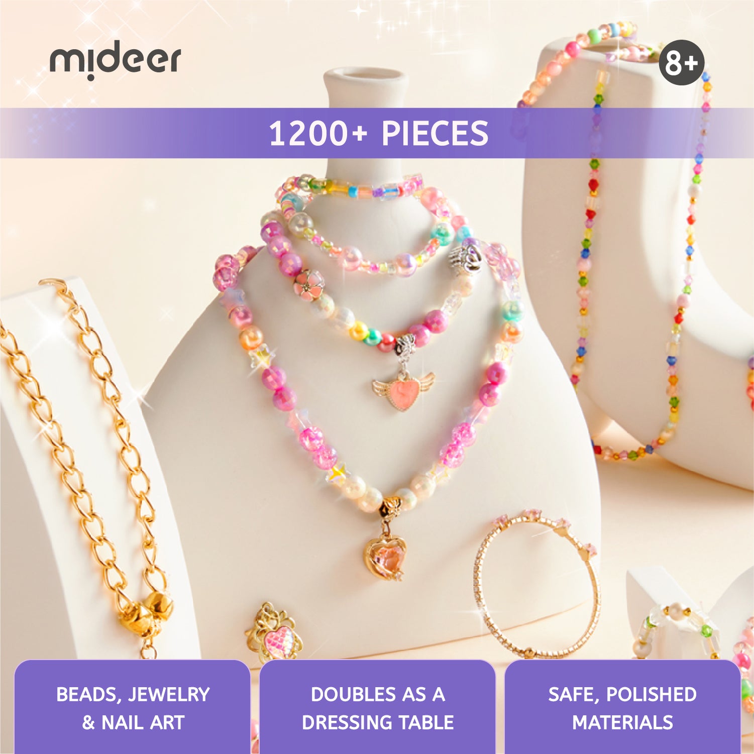 A promotional display for a children's jewelry set by mdeer, featuring pastel pink, yellow, and multicolor beaded necklaces, bracelets, and rings arranged on white mannequin busts. Text banners read '1200+ PIECES', '18+', and feature product benefits like 'BEADS, JEWELRY & NAIL ART', 'DOUBLES AS A DRESSING TABLE', and 'SAFE, POLISHED MATERIALS'.