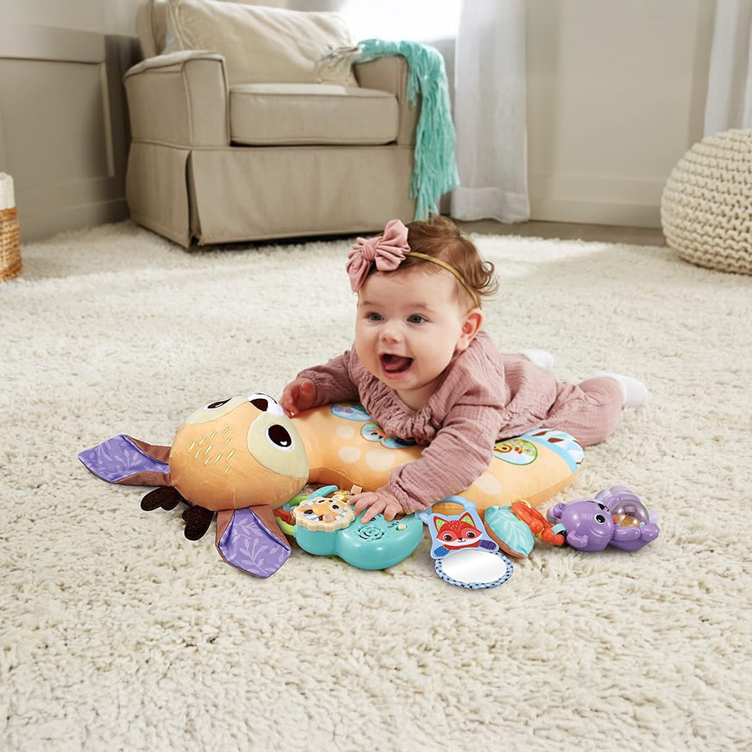 Baby Playing on Fawn Tummy Time Pillow with Musical Piano