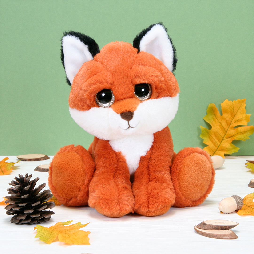 Close-up of the Puppy Eyes Pets Plush Toy's face and expressive eyes