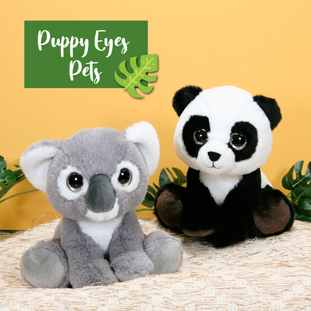 Close-up of the Puppy Eyes Pets Plush Toy's face and expressive eyes