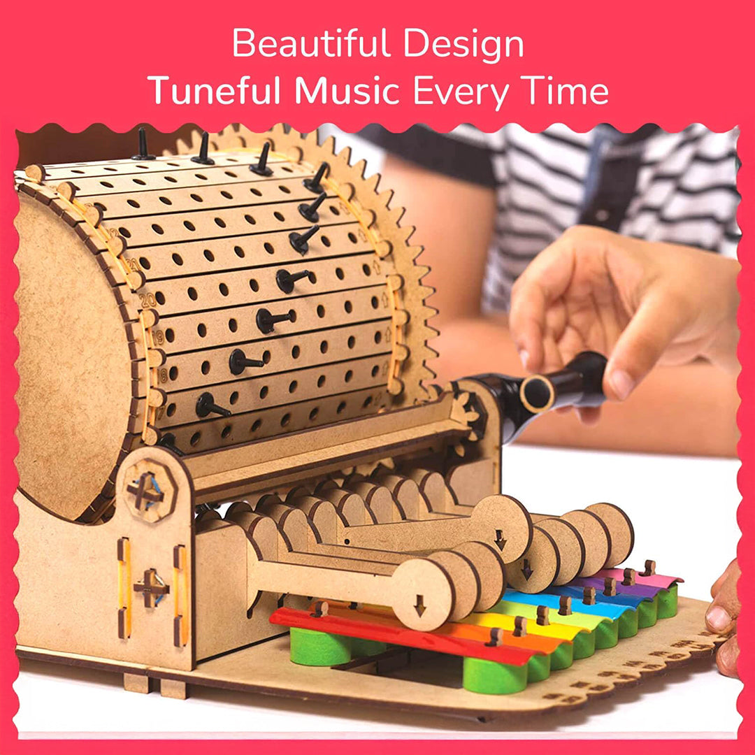 A child assembling the wooden and metal parts of the music box
