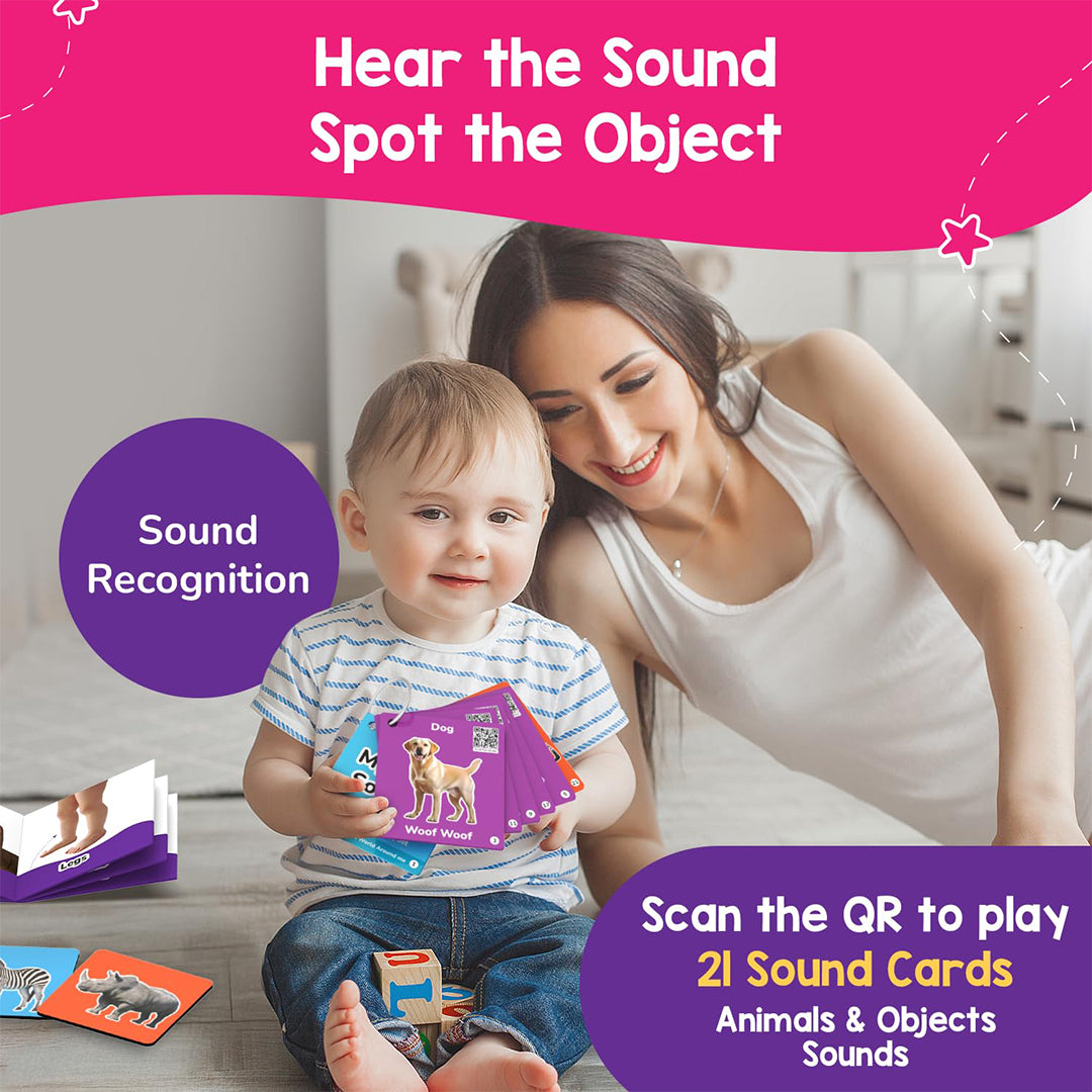 A toddler playing with the wooden sorting board from the kit
