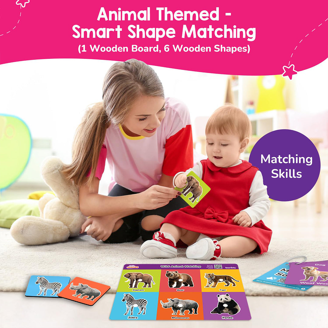 A toddler playing with the wooden sorting board from the kit
