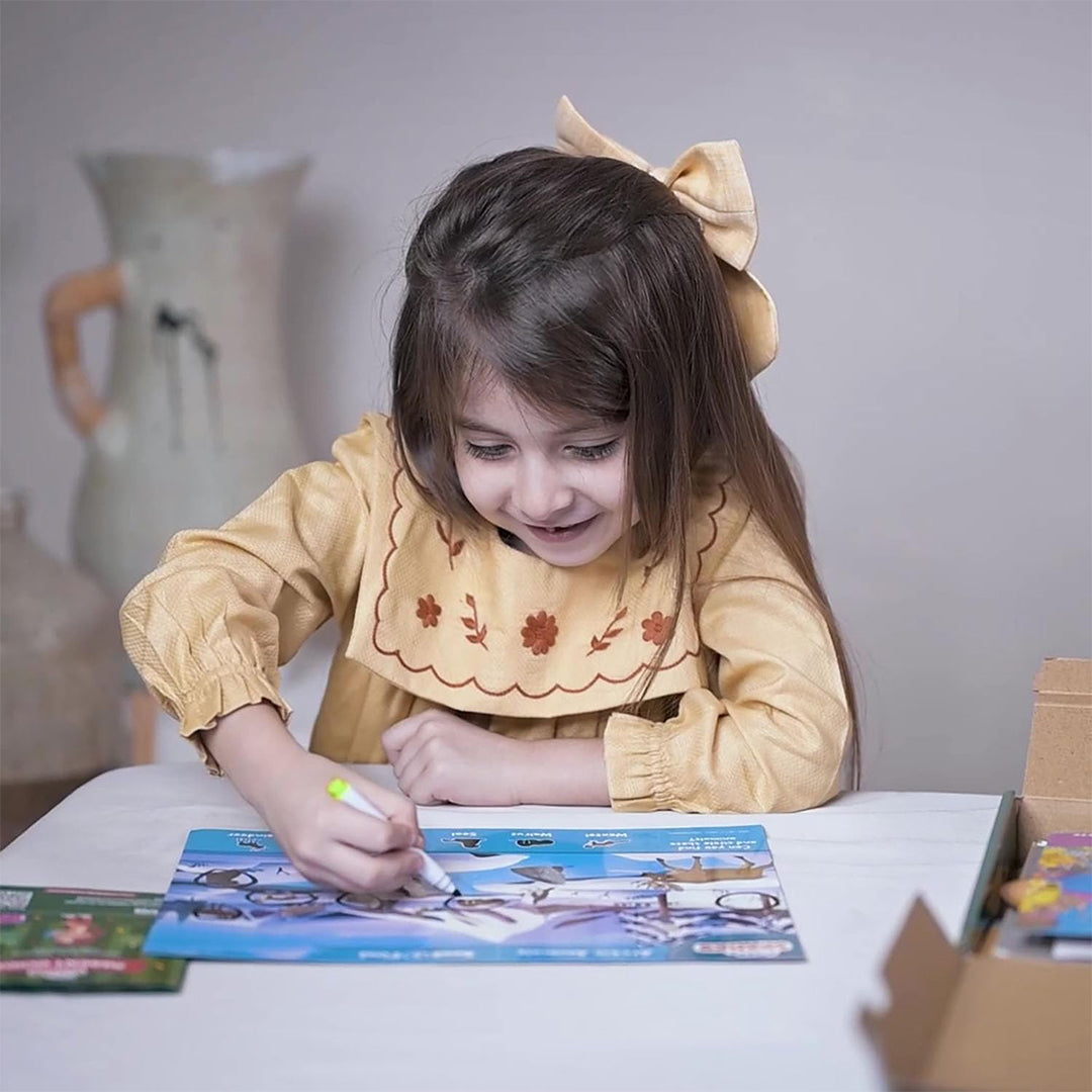 A photo showing a child engaged in the lacing activity
