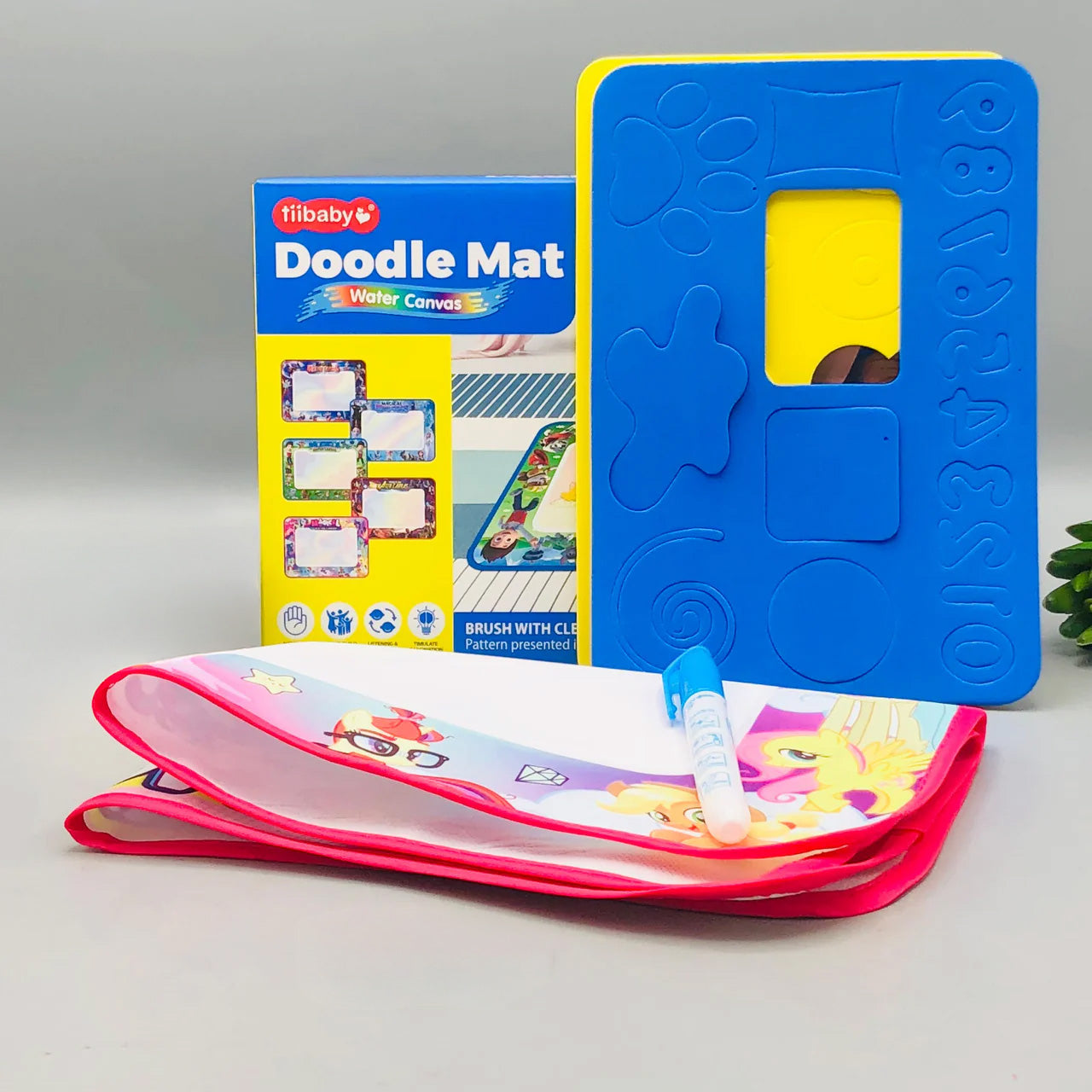 Educational water doodle mat showing disappearing drawings