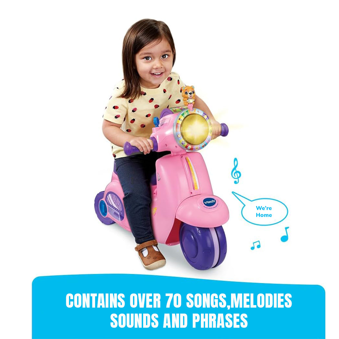 Child Pressing Buttons on VTech Scooter for Road Safety Phrases
