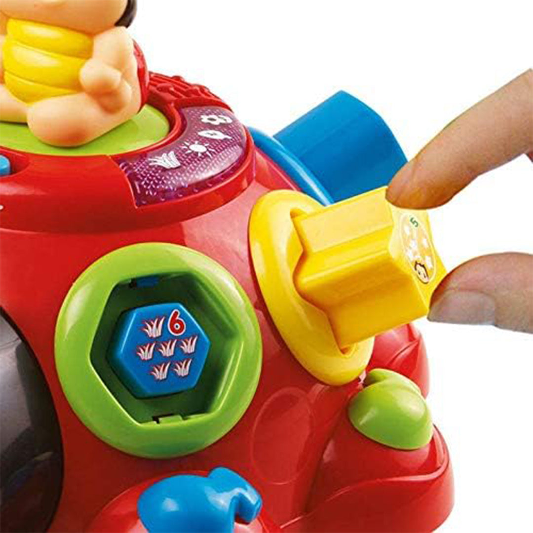 Colorful Shape Blocks Being Sorted into VTech Ladybug Toy