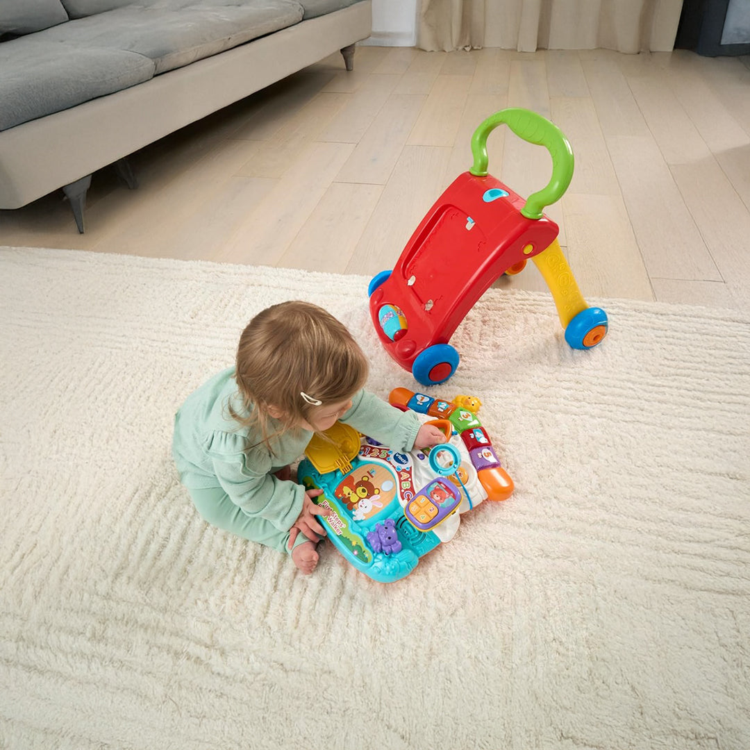 Infant Playing with Removable Activity Center from VTech Walker