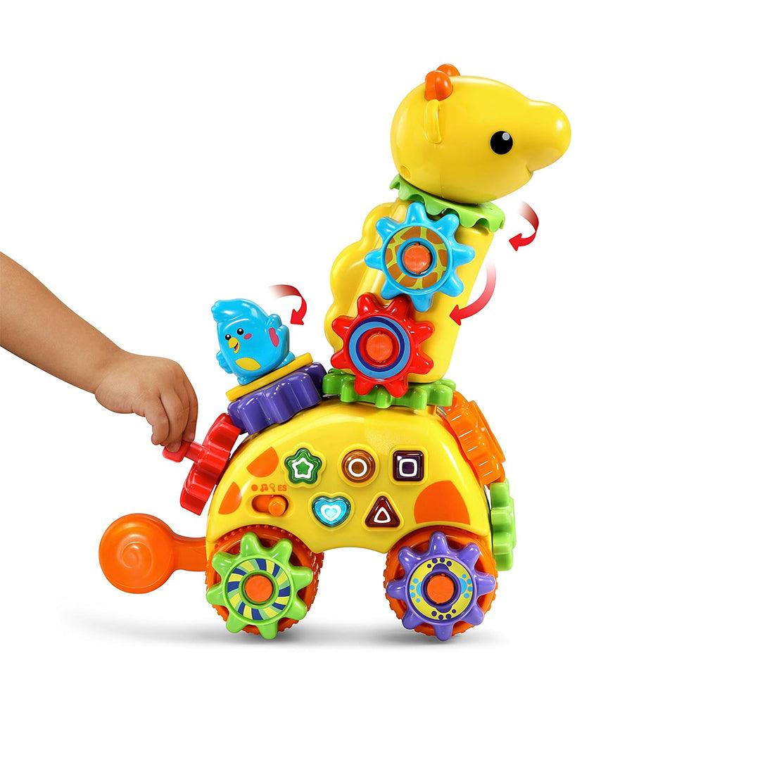 Child Pushing Along the VTech Gear Up & Go Gearaffe Toy
