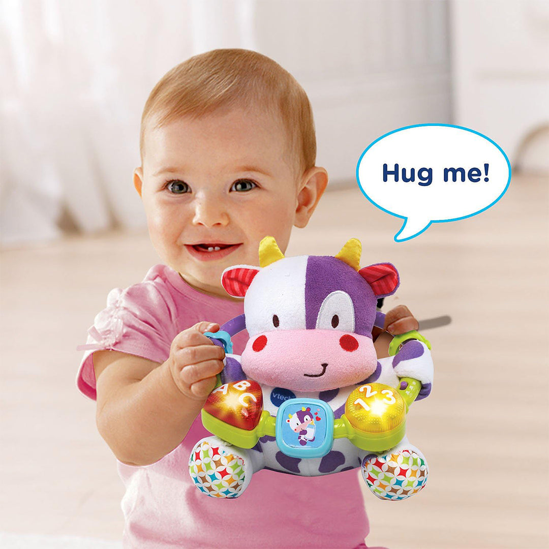 VTech Lil' Critters Musical Beads Purple – Educational Plush Cow Soft Toy for Newborns & Babies | Teaches Shapes, Colors, Numbers, Letters & Sensory Skills