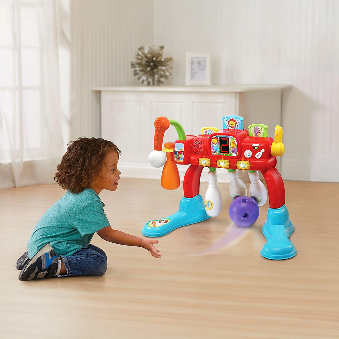 Kids Playing with Peek-A-Boo Animals on Swing & Strike Sports Toy