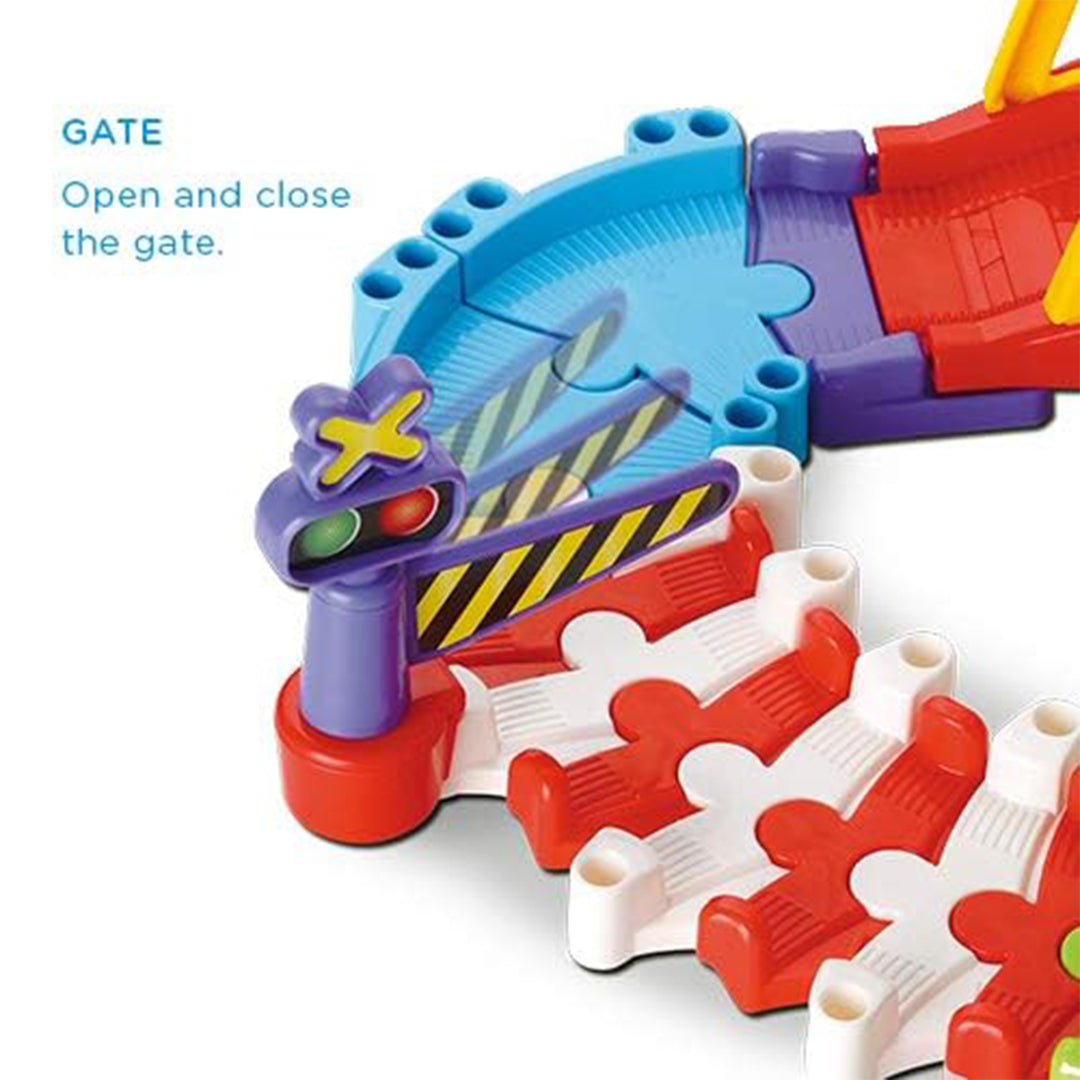 Overview of VTech Train Set Showing Varied Track Combinations
