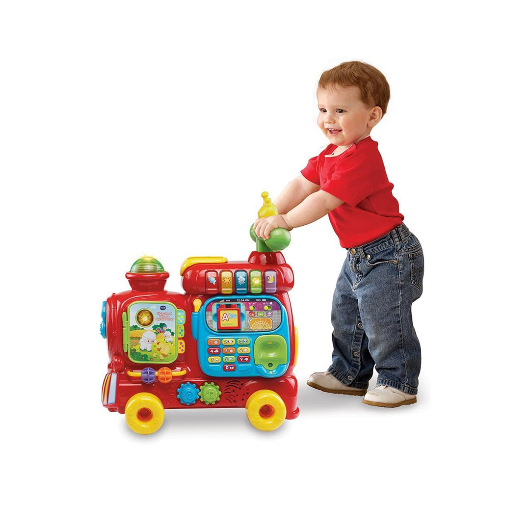 Child Riding VTech Alphabet Train Toy as a Ride-On
