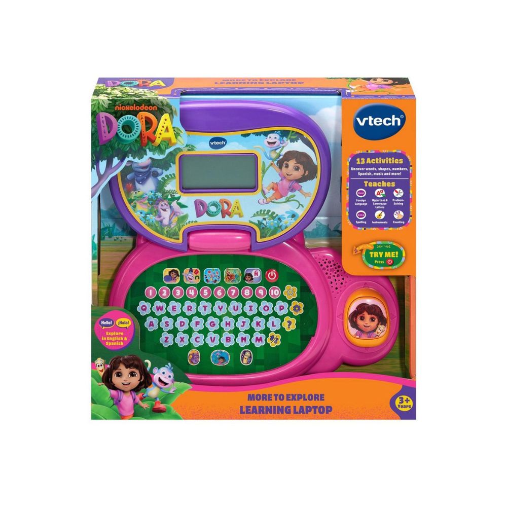 Vtech Dora the Explorer learning toy laptop in its original retail packaging, featuring a pink and purple keyboard with colorful educational buttons and Dora character graphics.