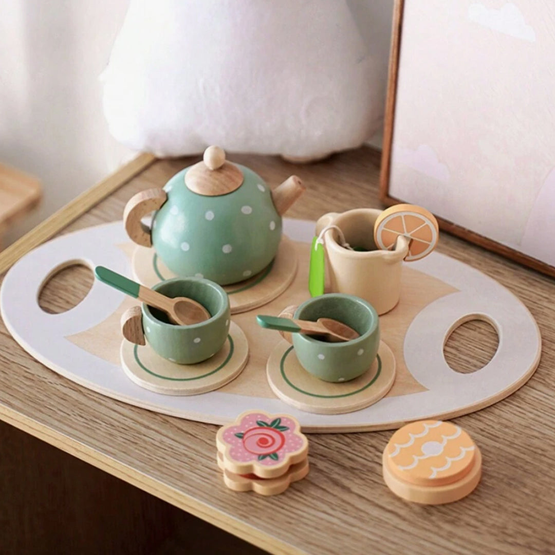 Child enjoying imaginative pretend play with the 15-Piece Wooden Tea Party Set for kids in the UAE