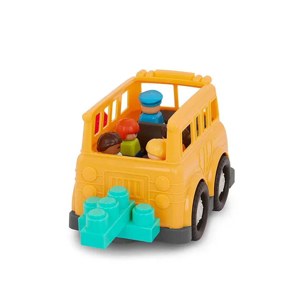 The Locbloc school bus with building blocks stacked on its roof demonstrates the Diy Playset for Kids feature.