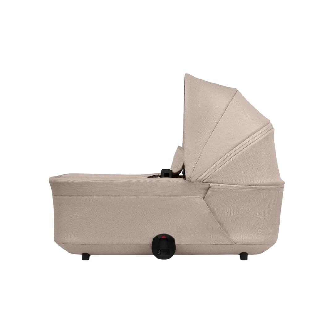 Joolz Hub² carrycot in Sandy Taupe shown fully assembled on stroller, lightweight newborn bassinet with modern urban design